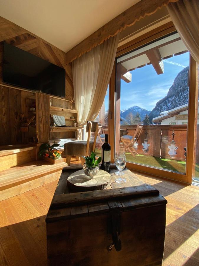 Calore Di Una Casa Di Montagna Campitello di Fassa Extérieur photo