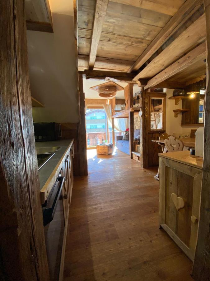 Calore Di Una Casa Di Montagna Campitello di Fassa Extérieur photo